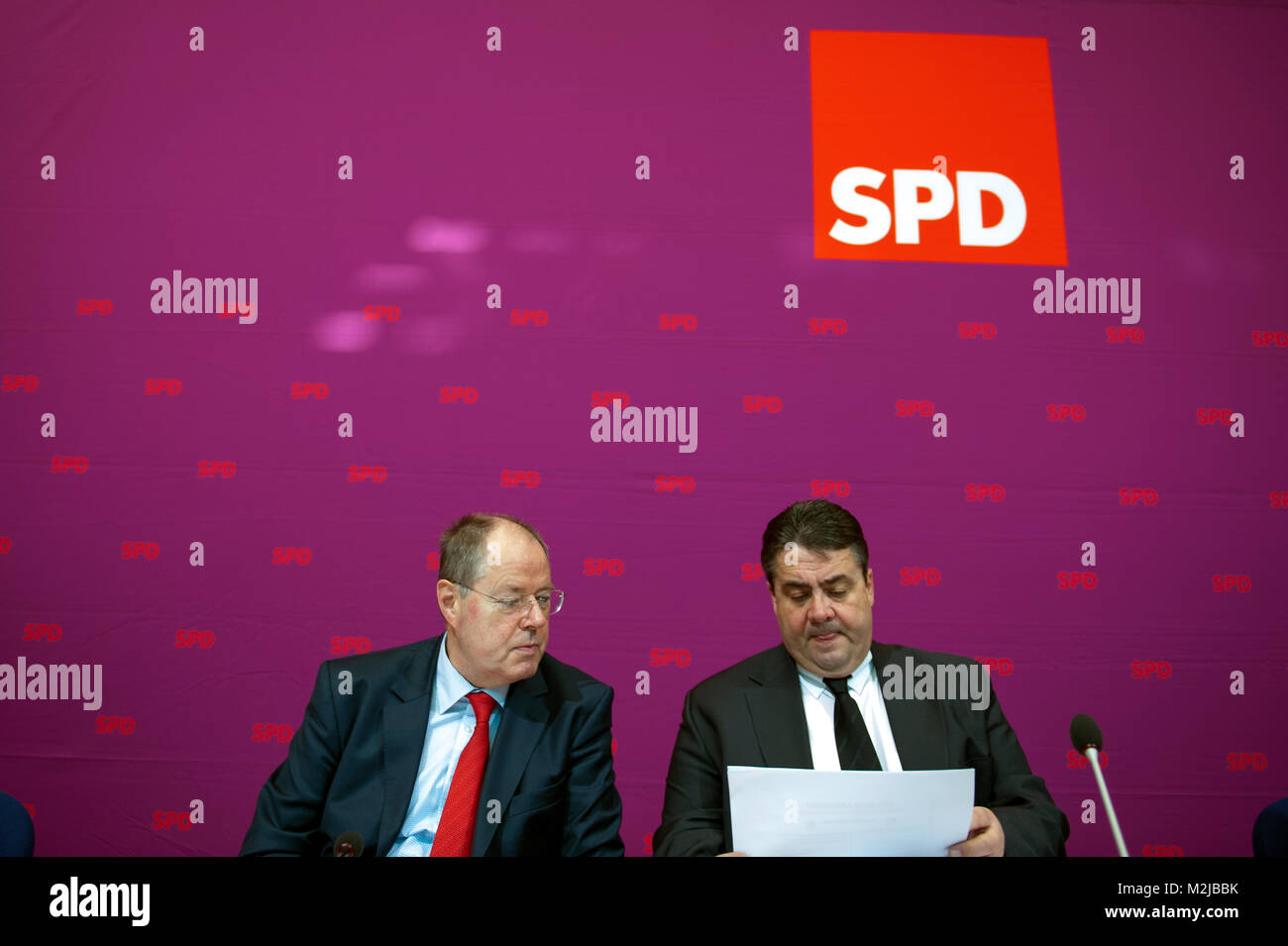 SPD party executive meeting. Social Democratic Party of Germany is a social-democratic political party in Germany. Peer Steinbrück and Sigmar Gabriel talking before the meeting. Stock Photo
