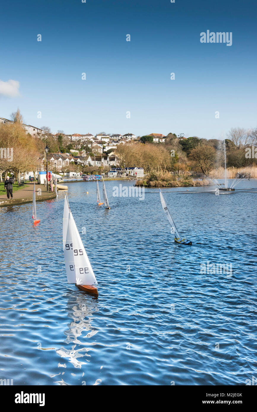 Model sailboats on Trenance Boating Lake in Newquay Cornwall. Stock Photo