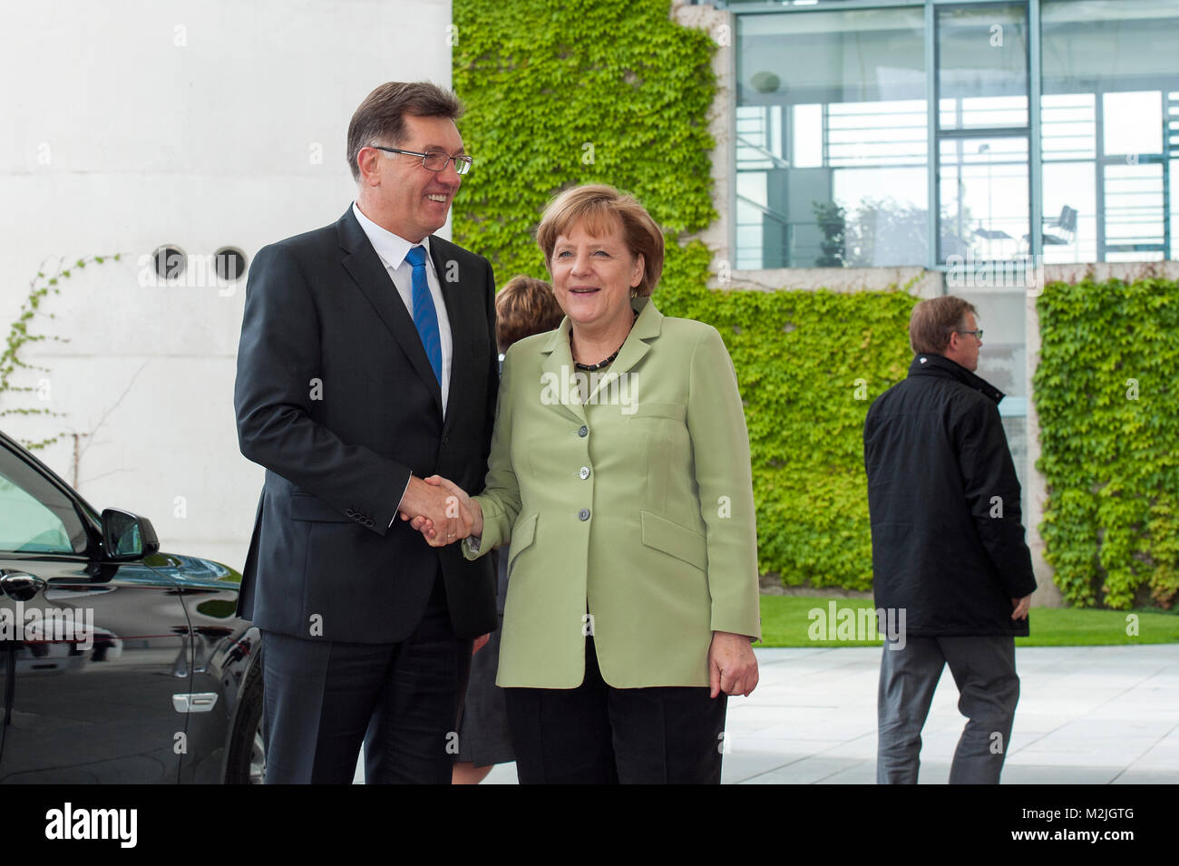 German Chancellor Angela Merkel receives Prime Minister of the Republic of Lithuania, Algirdas Butkevicius, with military honors in the Federal Chancellery. Stock Photo