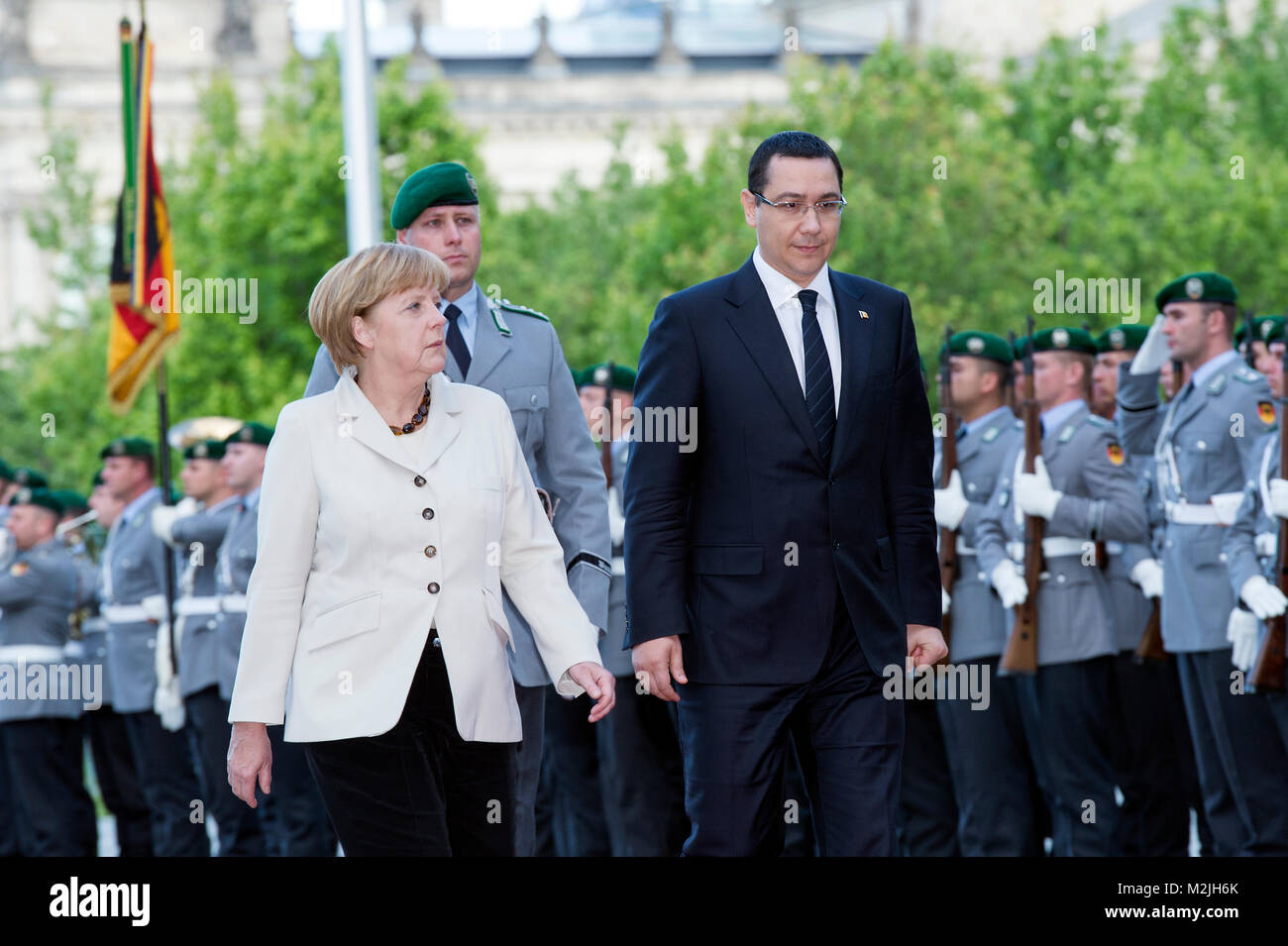 German Chancellor Angela Merkel receives with Military honors the Romanian Prime Minister Victor Ponta to a bilateral meeting to talk about European and International issues. Stock Photo