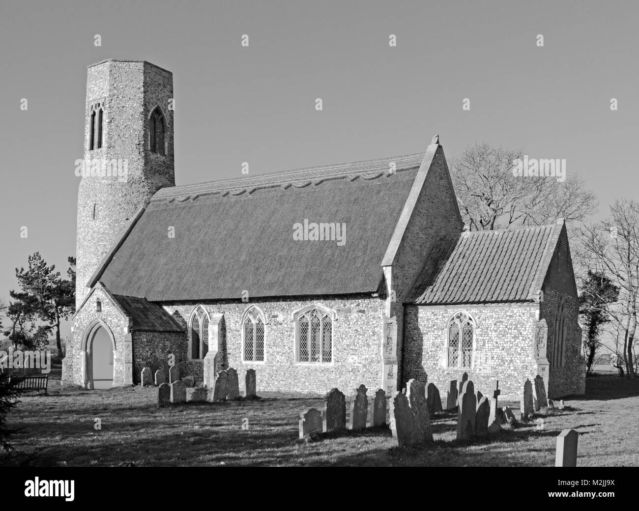 A black and white image of the church of All Saints at Edingthorpe