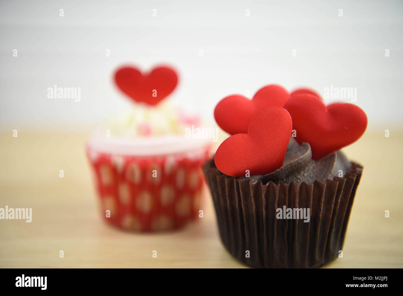 romantic valentines day chocolate cupcake with red love heart ...