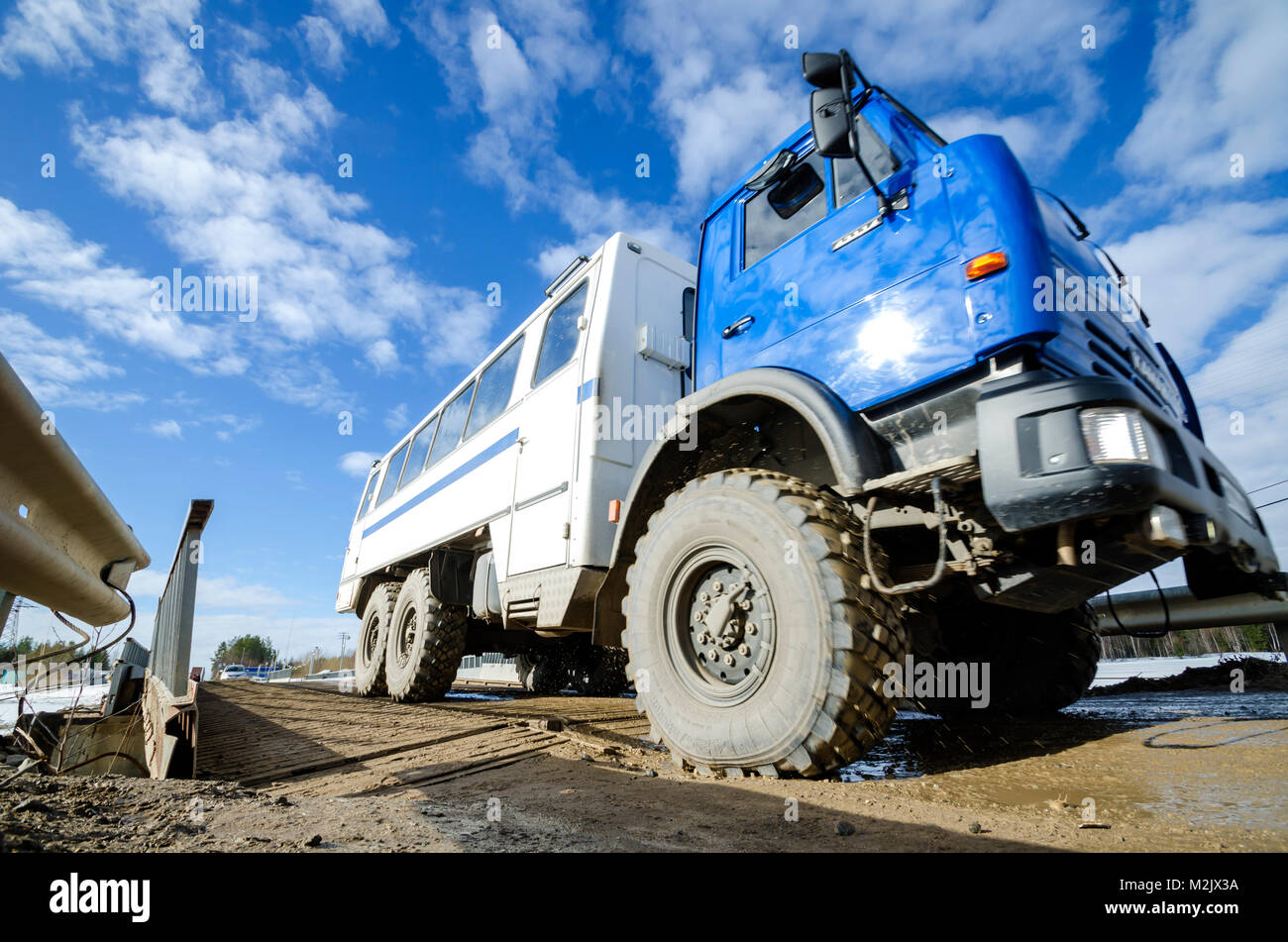 Truckshift. Allwheel drive bus for transporting workers Stock Photo