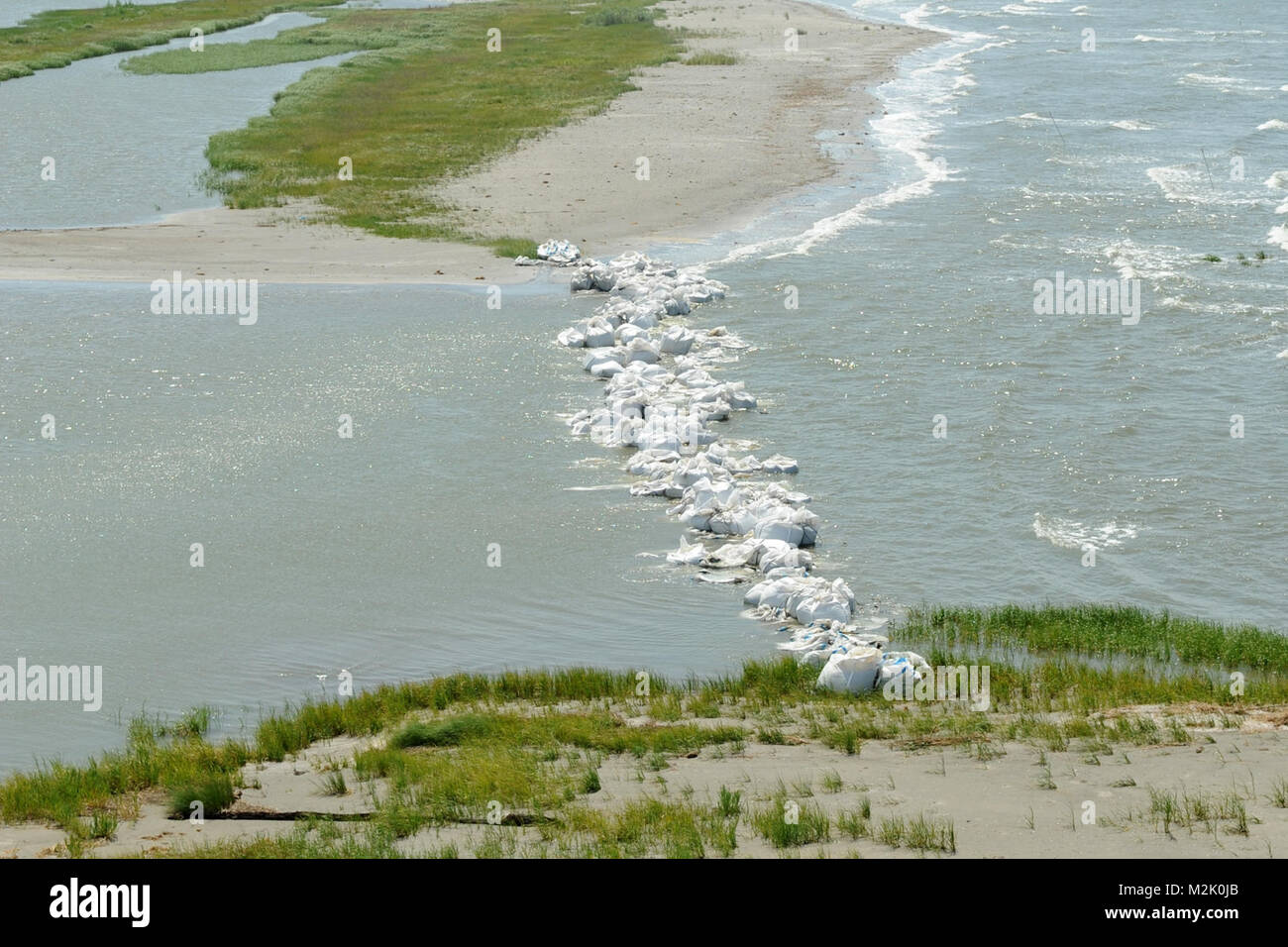 BURAS, La. The Louisiana National Guard maintain sandbag barriers on