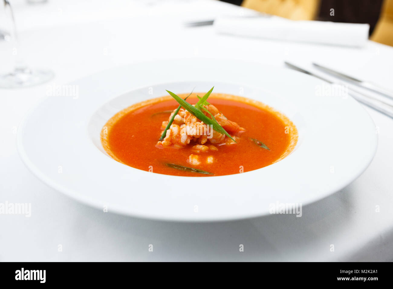 Garlic soup with prawns Stock Photo