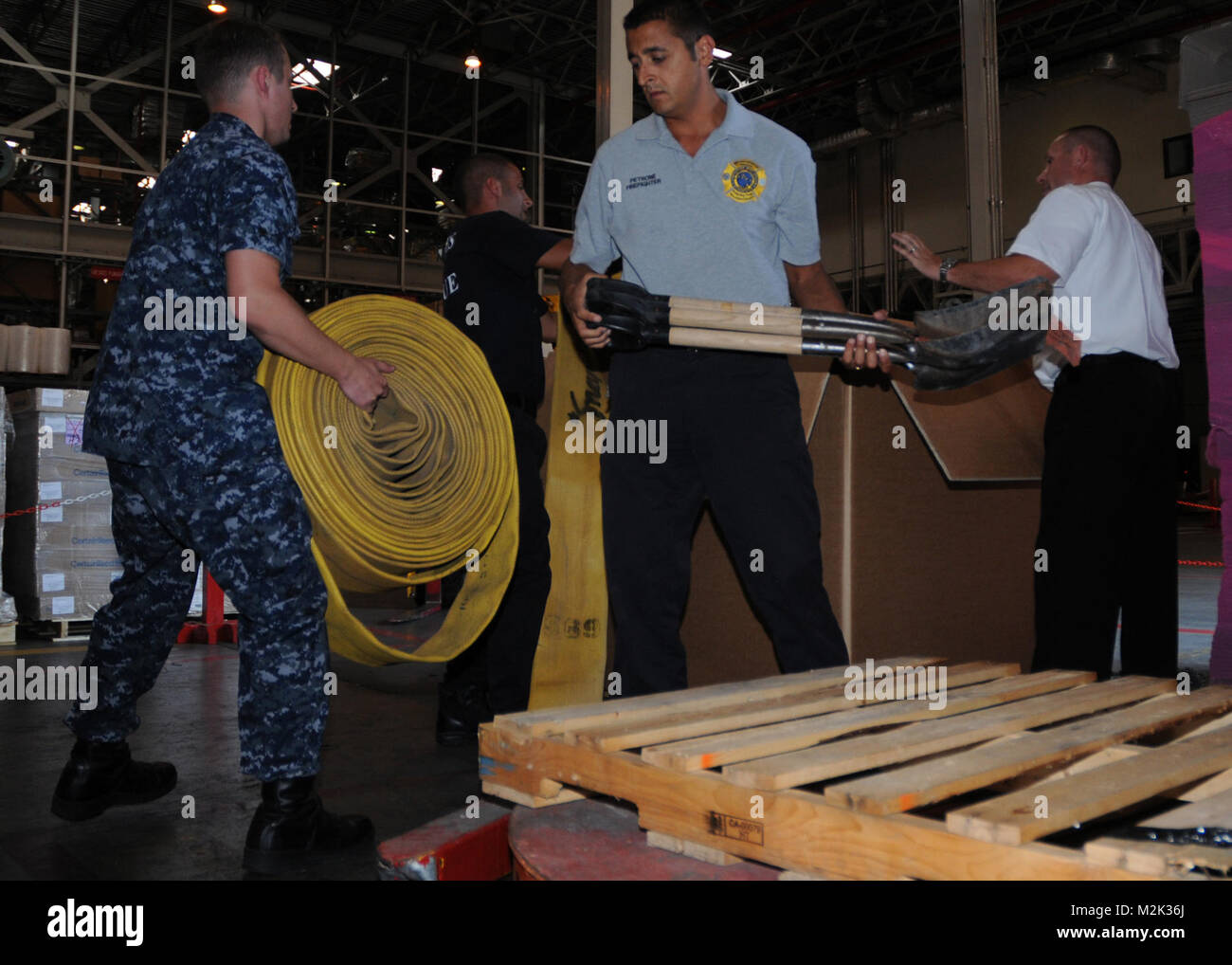 Personnel load firefighting equipment bound for Russia by EUCOM Stock ...