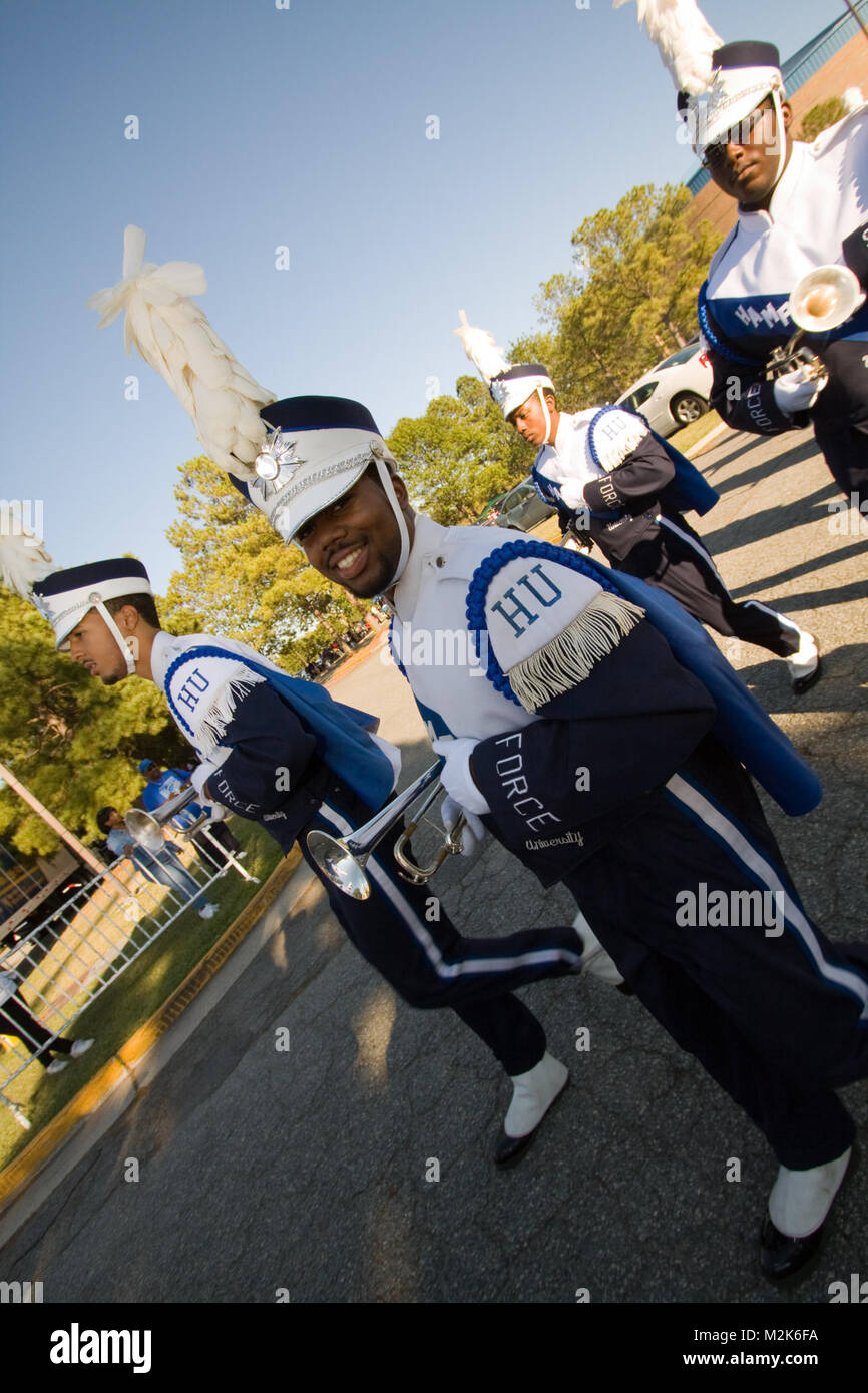 Members of the Hampton University marching band march to Armstrong