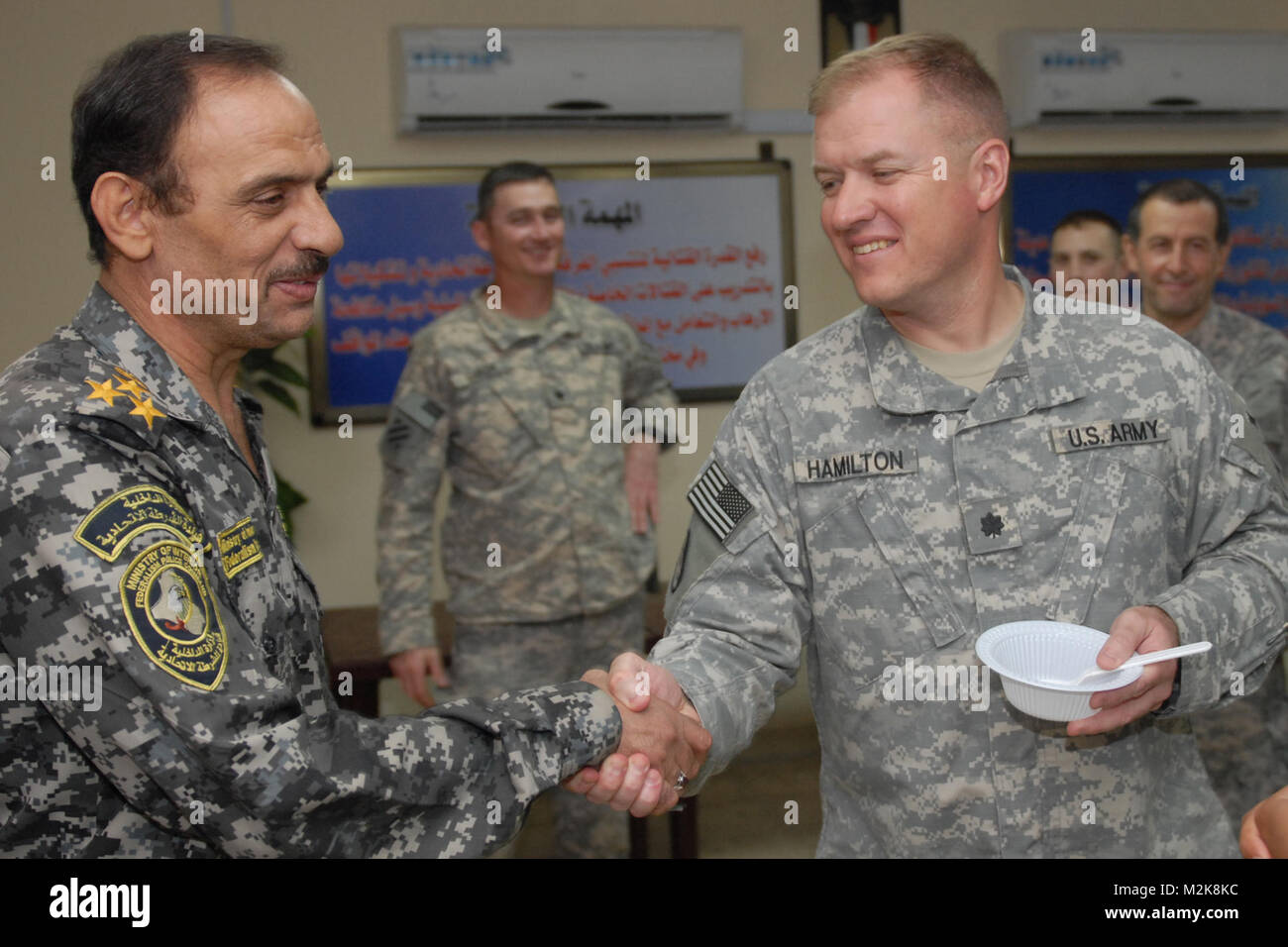 Shaking hands with Iraqi General by 1st Armored Division and Fort Bliss ...