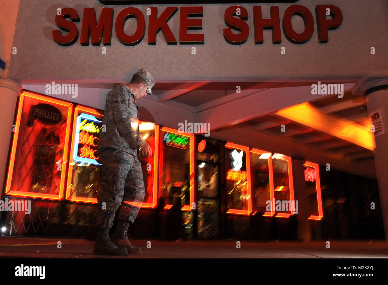 A U.S. Airman leaves a smoke shop near Nellis Air Force Base, Nev., Oct. 28, 2010. Many shops sold Spice and other substances that produce effects similar to those of marijuana. While the items were banned by the Department of Defense, they were legal in the civilian community until Nov. 24, when the Drug Enforcement Administration enacted a nationwide ban on Spice and similar products. (U.S. Air Force photo illustration by Tech. Sgt. Michael R. Holzworth/Released) tobacco-free-living-101028-F-3431H-333 by MilitaryHealth Stock Photo