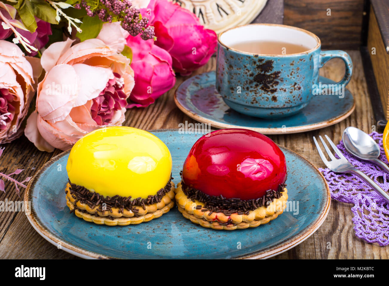 Mousse cakes with mirror glaze Stock Photo