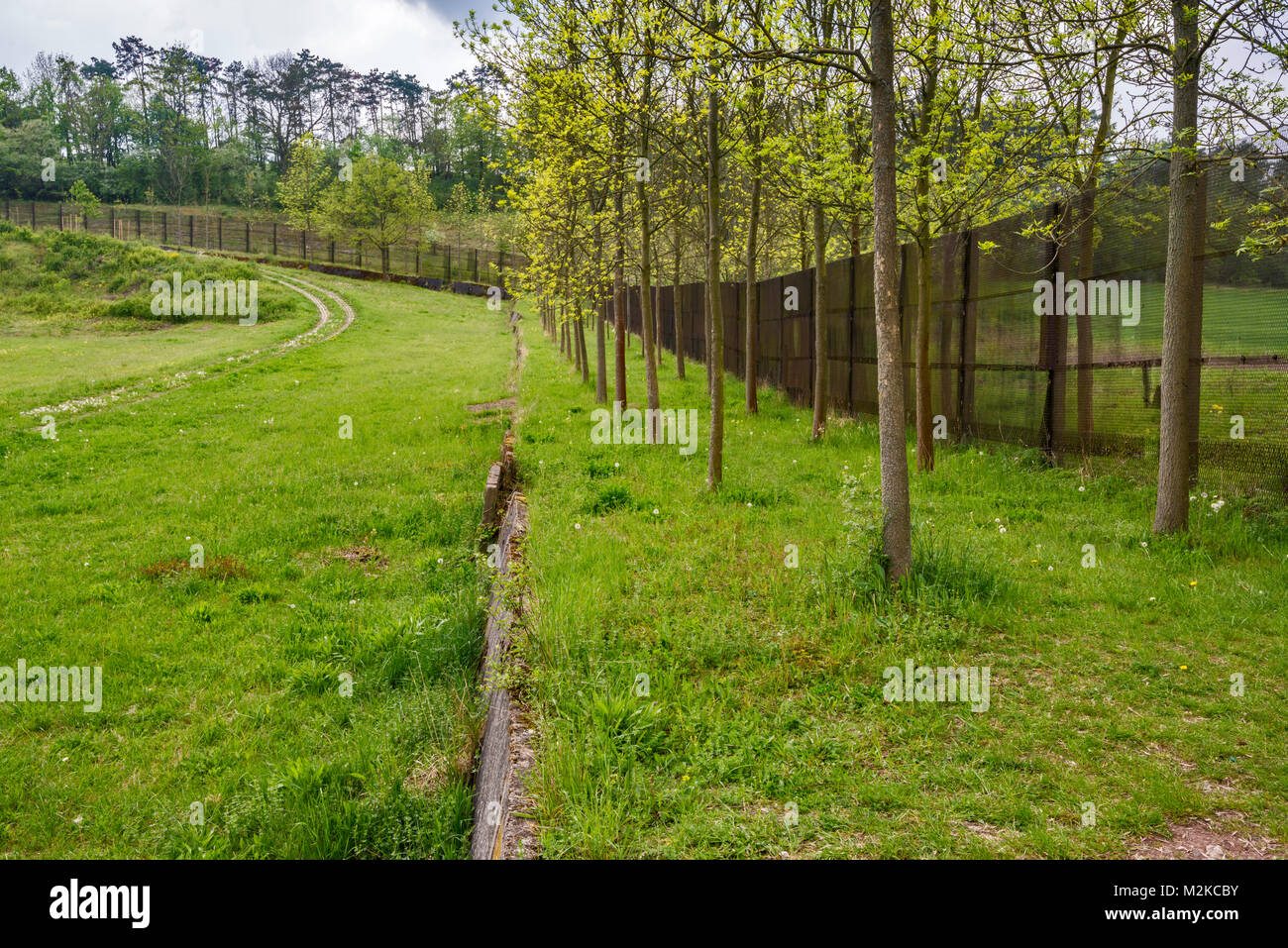 Fence, concrete barrier at former Iron Curtain, borderline until 1989 between West and East Germany, near town of Ifta, Thuringia, Germany Stock Photo