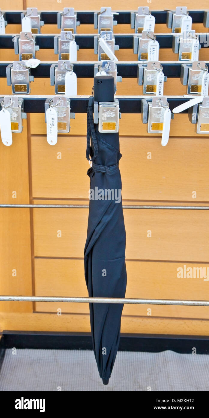 TOKYO, JAPAN OCTOBER 28, 2014 Umbrella holder and locker in Tokyo