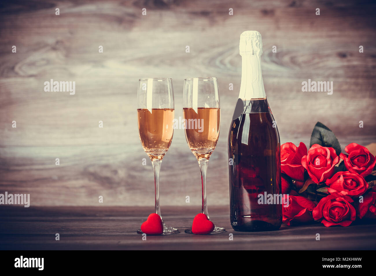 Valentines Day Champagne Wine Glasses And Red Roses With