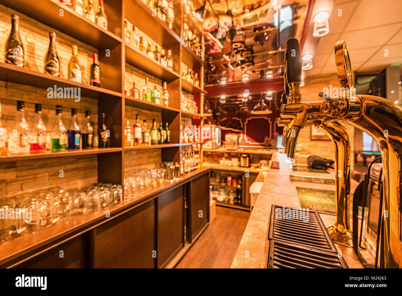 Bar shelf with empty beer glasses Stock Photo Alamy