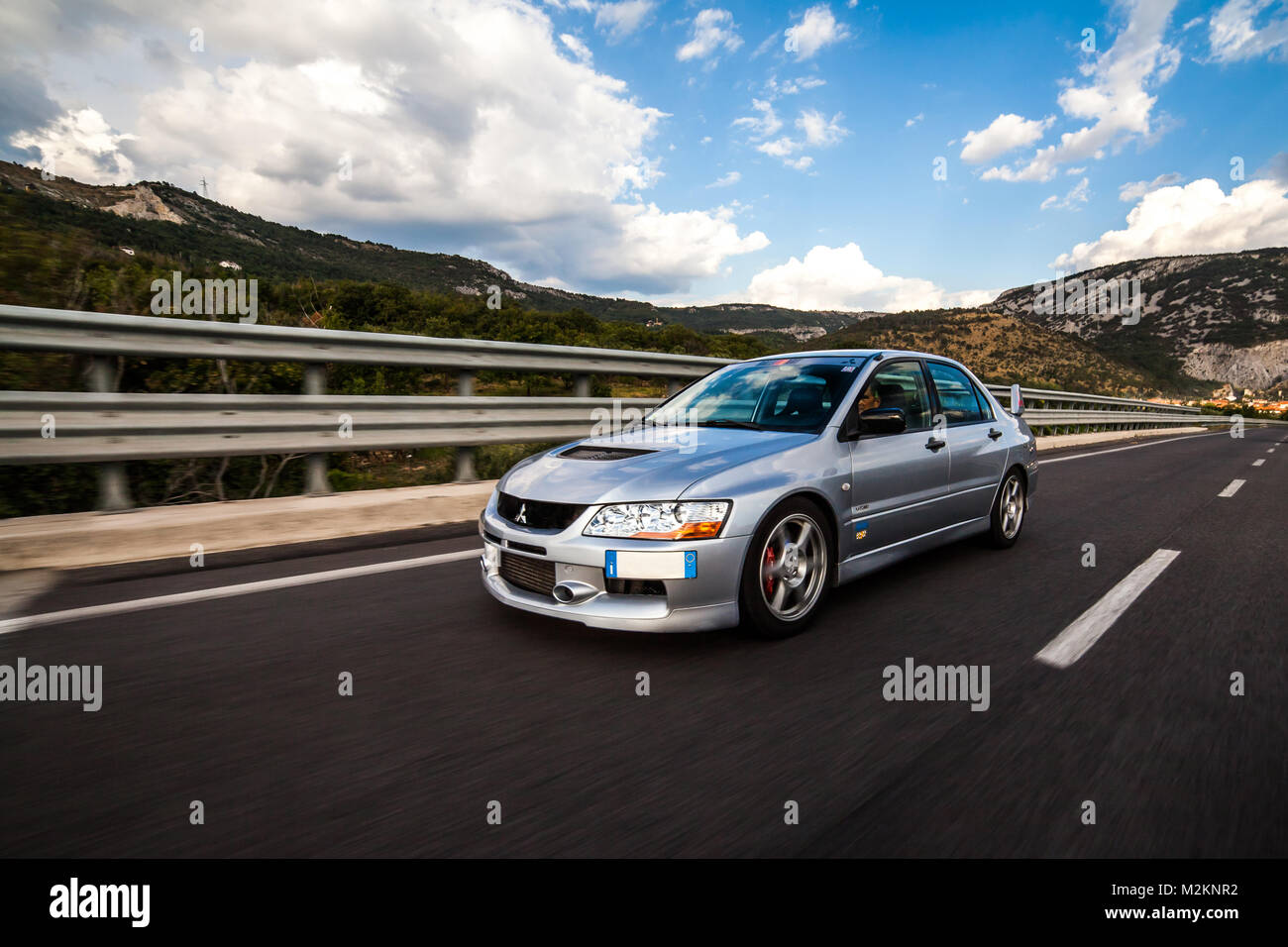Trieste, Italy - SEPTEMBER 3, 2013: Photo of Mitsubishi EVO 8 .The Lancer Evolution 8 sedan features a newly designed 4B11T 2.0L (1998cc) turbocharged Stock Photo