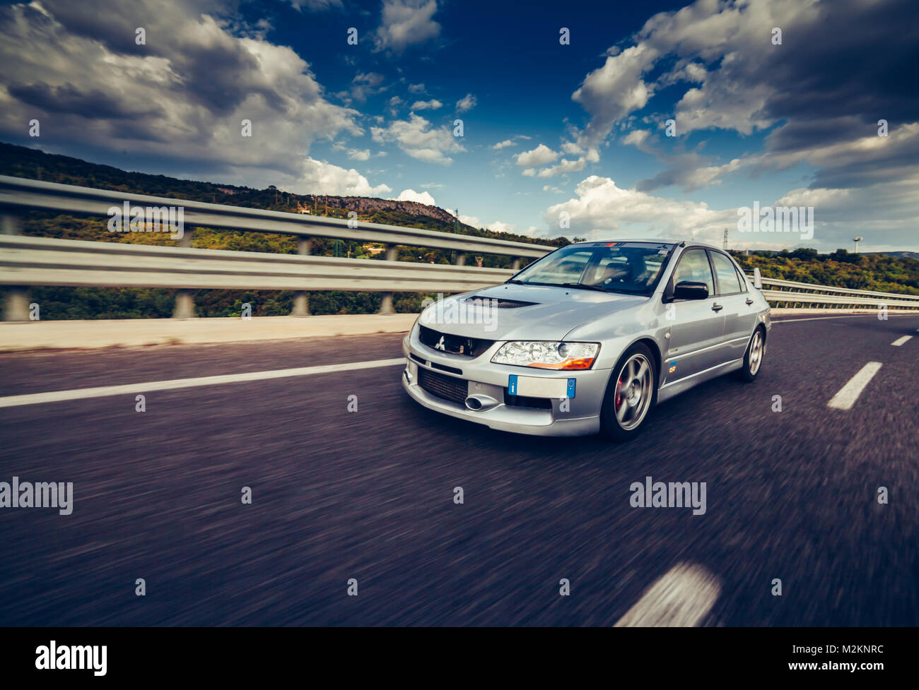 Trieste, Italy - SEPTEMBER 3, 2013: Photo of Mitsubishi EVO 8 .The Lancer Evolution 8 sedan features a newly designed 4B11T 2.0L (1998cc) turbocharged Stock Photo