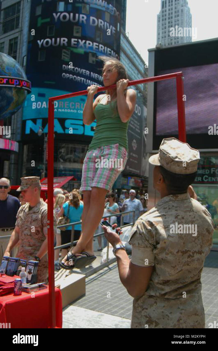 Kyla Kennedy of Plattsburgh N.Y. tries a flexed arm hang during Marine
