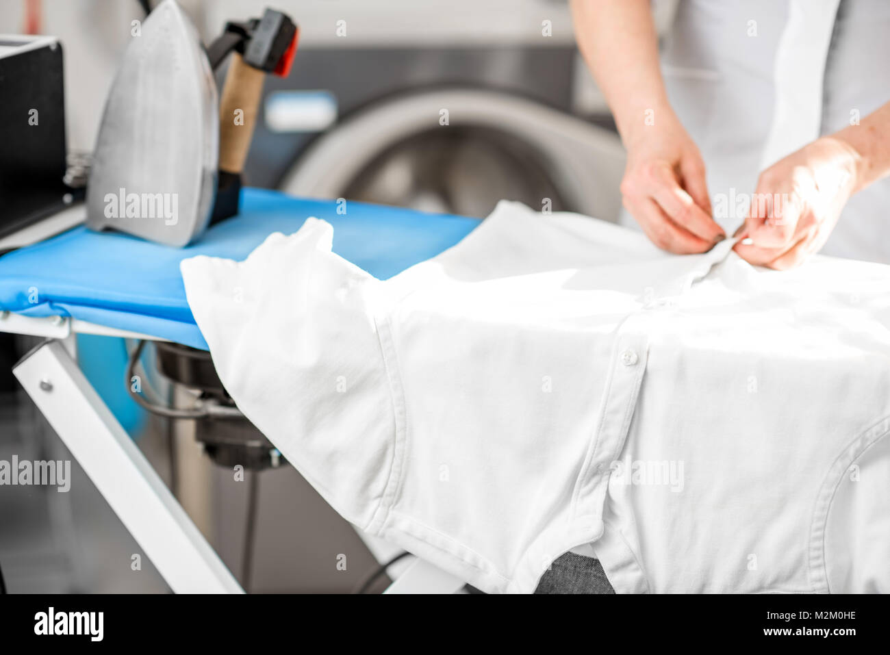 Ironing clothing industry hires stock photography and images Alamy