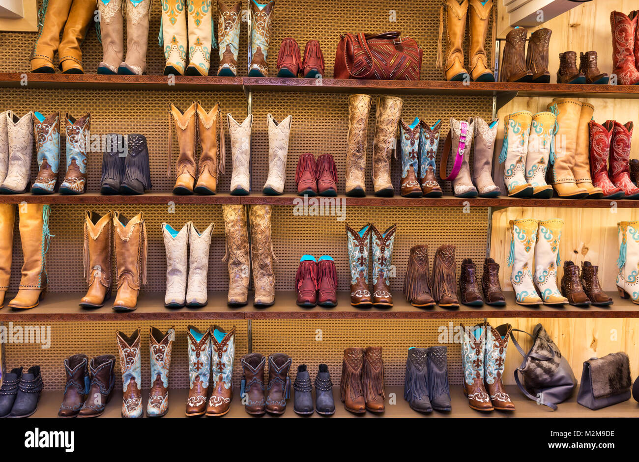 Cowboy boots on a shelf in a store, front view Stock Photo