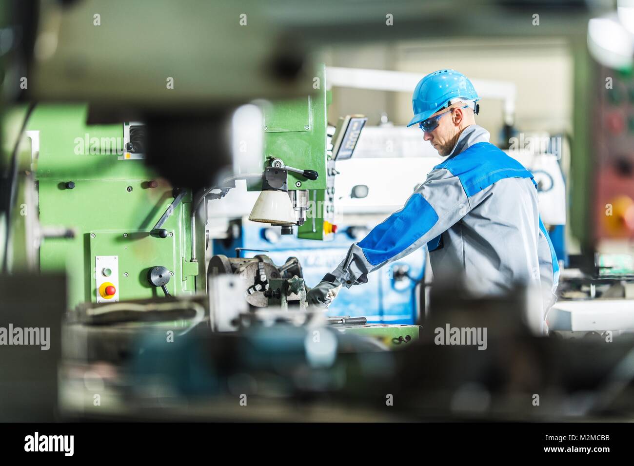 CNC Metal Lathe Technician Worker. Caucasian Contractor Operating Heavy ...