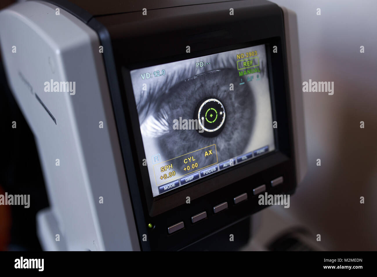 Auto-Ref-Keratometer display with an eye on it. Autorefractor Keratometer. eye test machine in physical examination. Stock Photo
