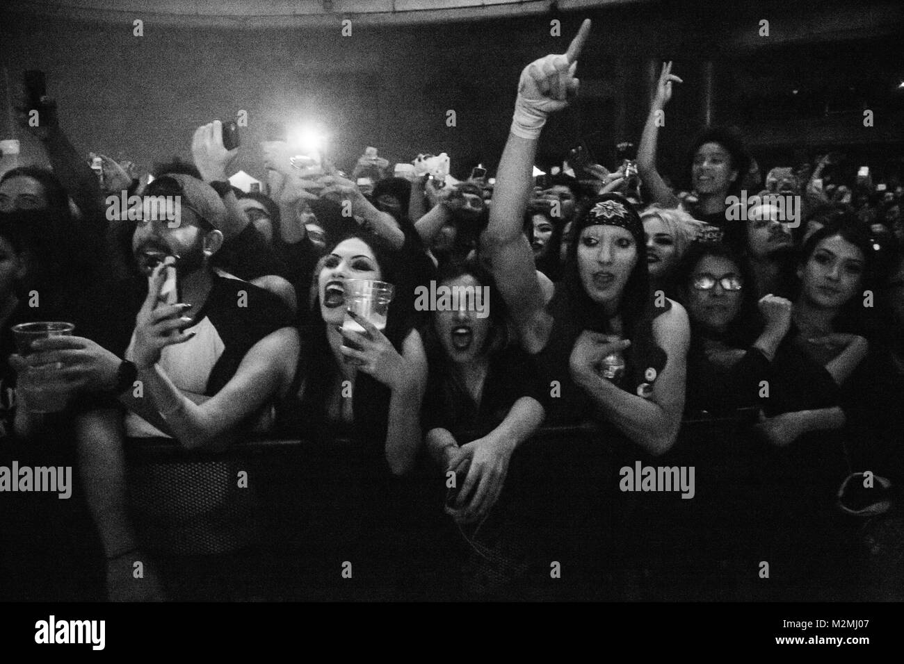 Fans in the front row at the Marilyn Manson show. Stock Photo