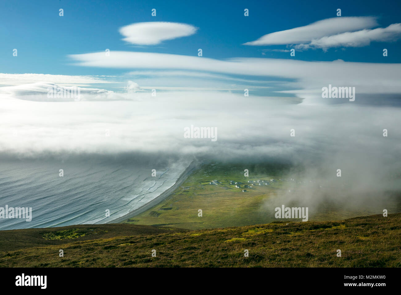 Sea fog rolling in over Keel Bay, Achill Island, County Mayo, Ireland. Stock Photo