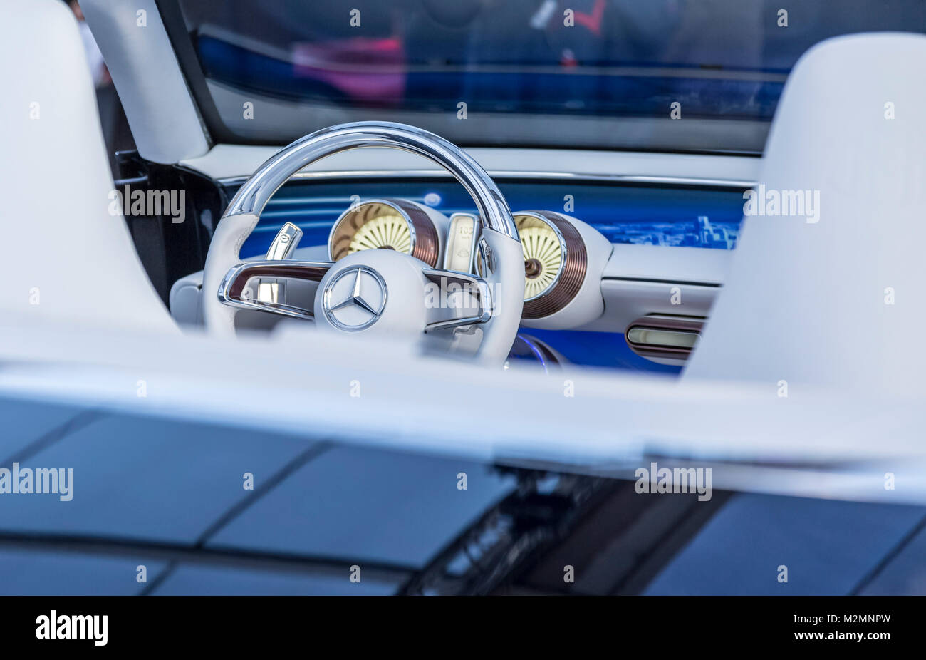 PARIS, FRANCE - FEBRUARY 04, 2018: Steering wheel with the famous Mercedes logo in the Vision Mercedes-Maybach 6 Cabriolet car (the winner of The Jury Stock Photo