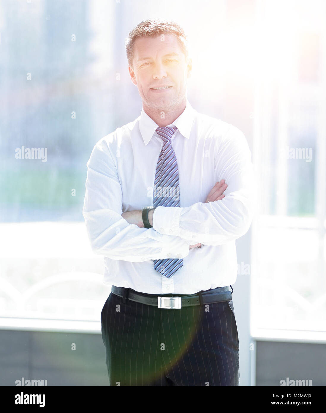 Full length portrait of confident mature businessman in formals ...