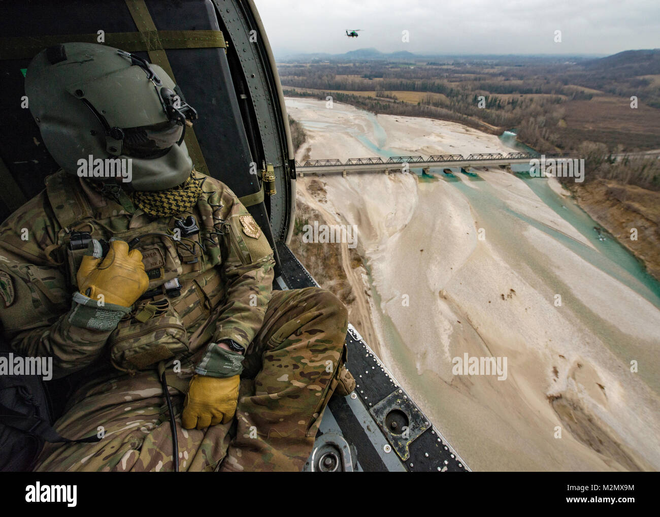 Two HH-60G Pave Hawk helicopters assigned to the 56th Rescue Squadron ...