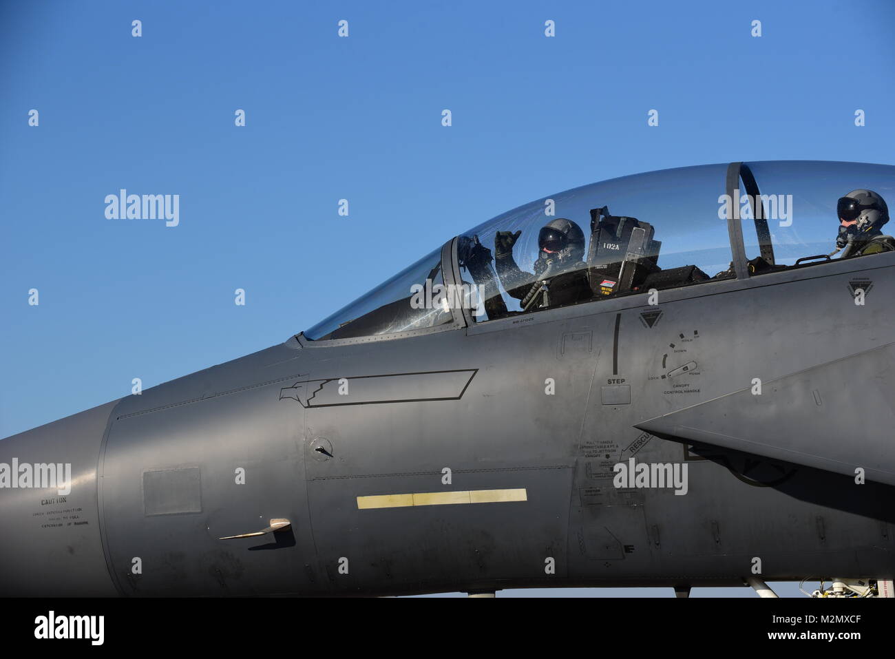 Maj. Wade Maulsby, 334th Fighter Squadron pilot, and 1st Lt. Mathew Clutts, 334th FS weapons systems operator, taxi before flight in an F-15E Strike Eagle, Feb. 5, 2018, at Seymour Johnson Air Force Base, North Carolina. Maulsby is the Air Combat Command nominee for the Colonel James Jabara Award for Airmanship, an award reserved for a U.S. Air Force Academy graduate whose accomplishments demonstrate superior performance in fields directly involved with aerospace vehicles. (U.S. Air Force photo by Airman 1st Class Kenneth Boyton) Stock Photo