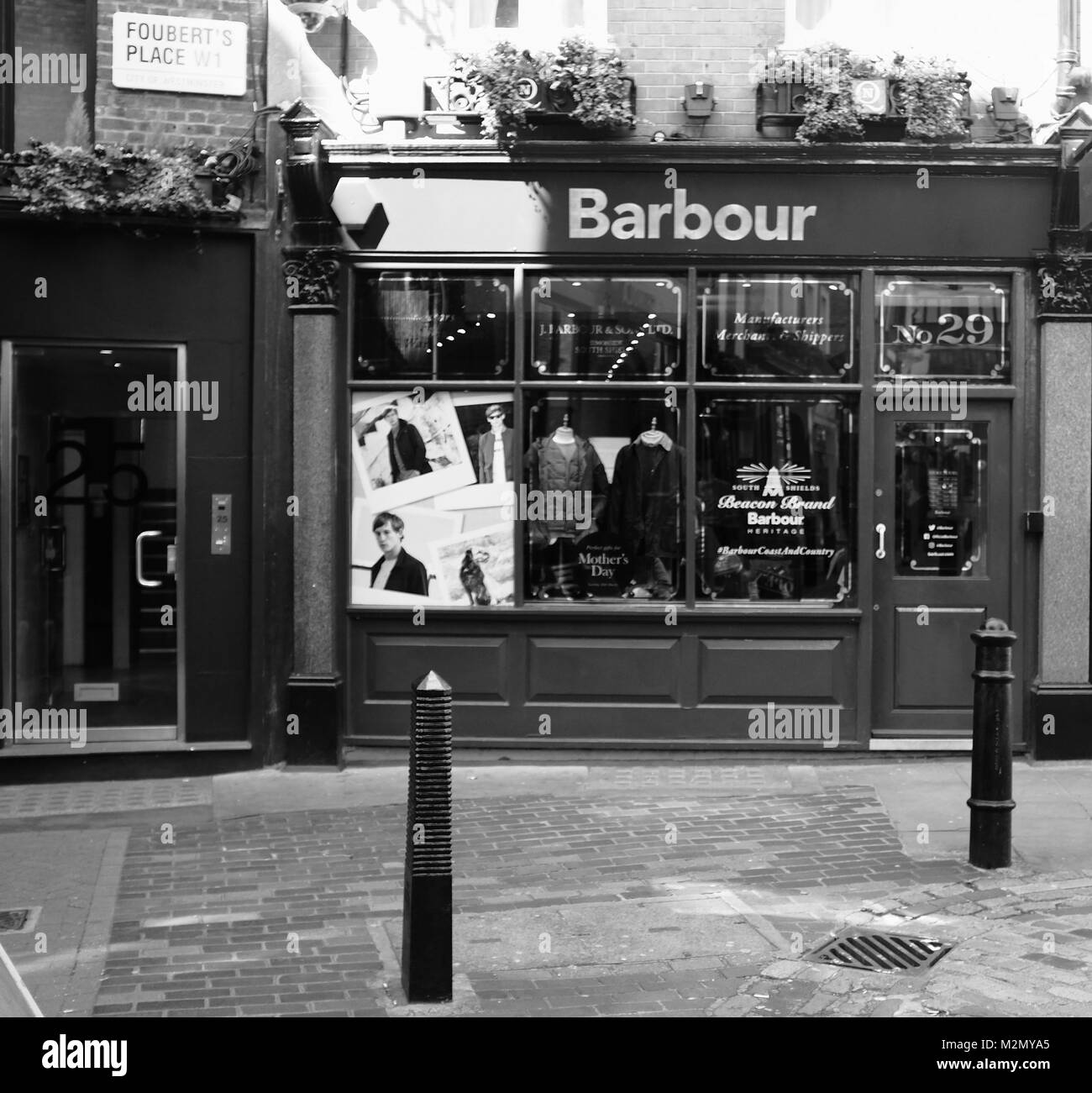 Black & White Photograph of Barbour Wax Jacket Shop in Fouberts Place,  Soho, London, England. United Kingdom, Credit: London Snapper Stock Photo -  Alamy