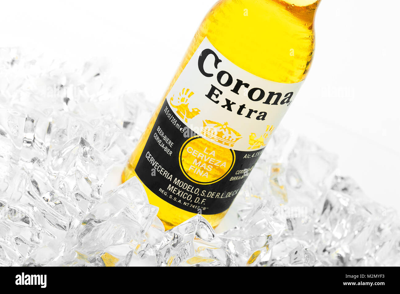 Trieste, Italy - June 23, 2016: Corona Extra is one of the top-selling beers worldwide is a pale lager produced by Cerveceria Modelo in Mexico. Stock Photo