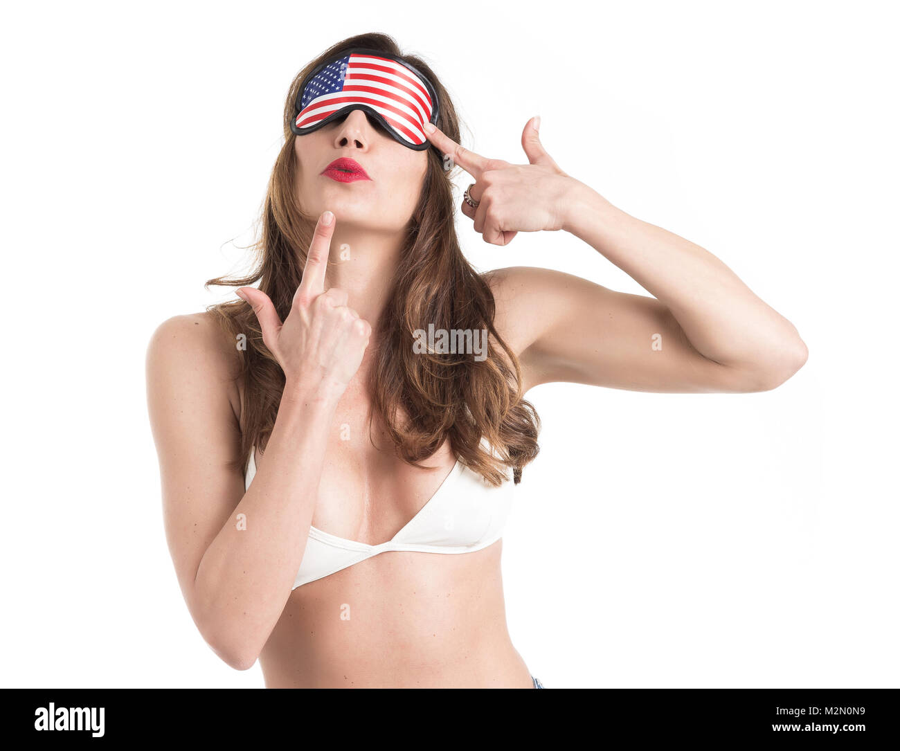 Young woman wearing eyemask. American Dream concept. Isolated on white background. Stock Photo