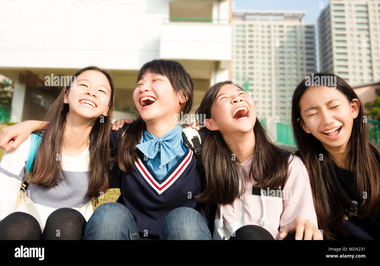 Group Of Teenage Students girls having fun Stock Photo