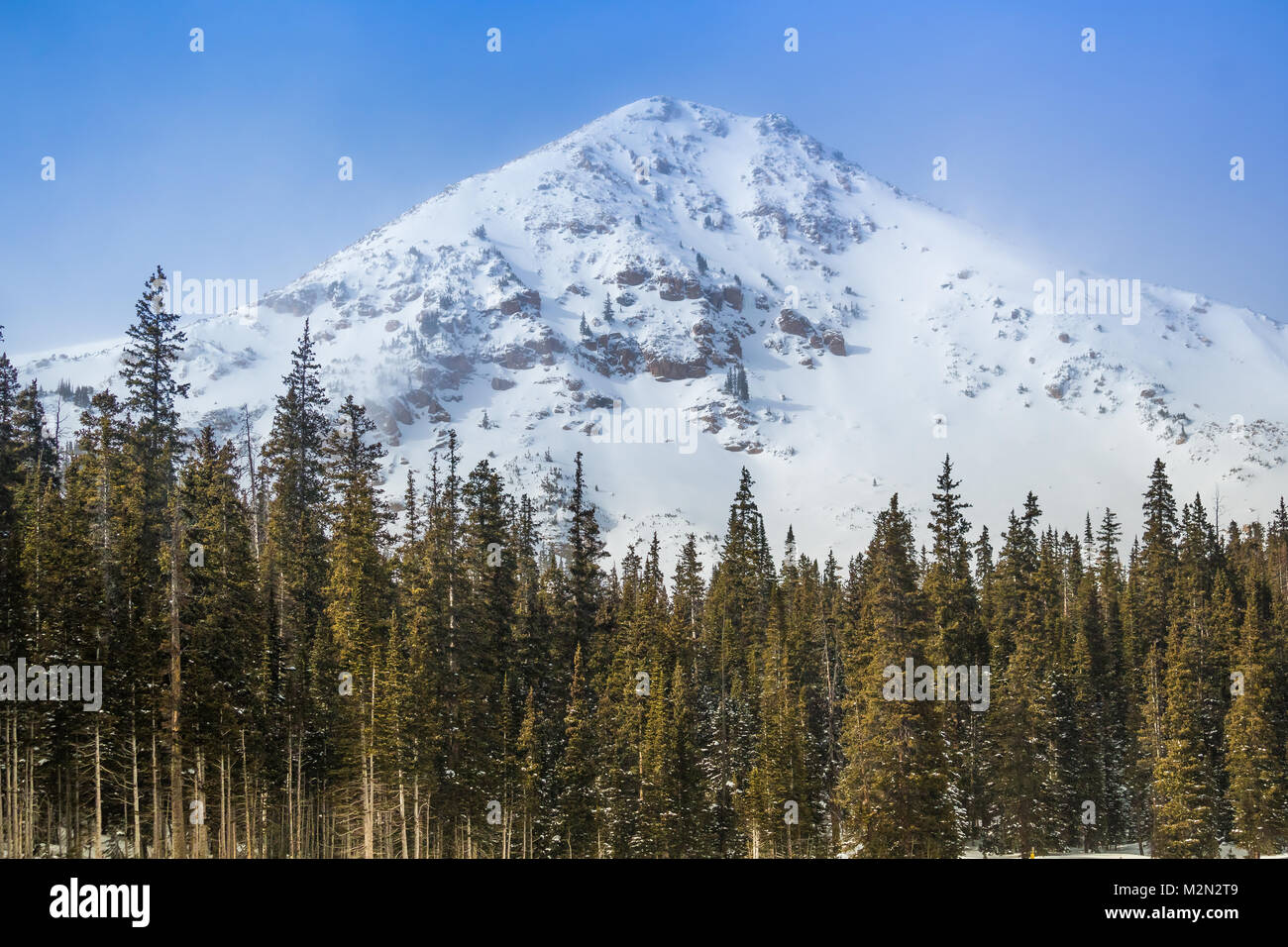Beautiful view of a mountain peak near Winter Park, Colorado, covered with snow Stock Photo