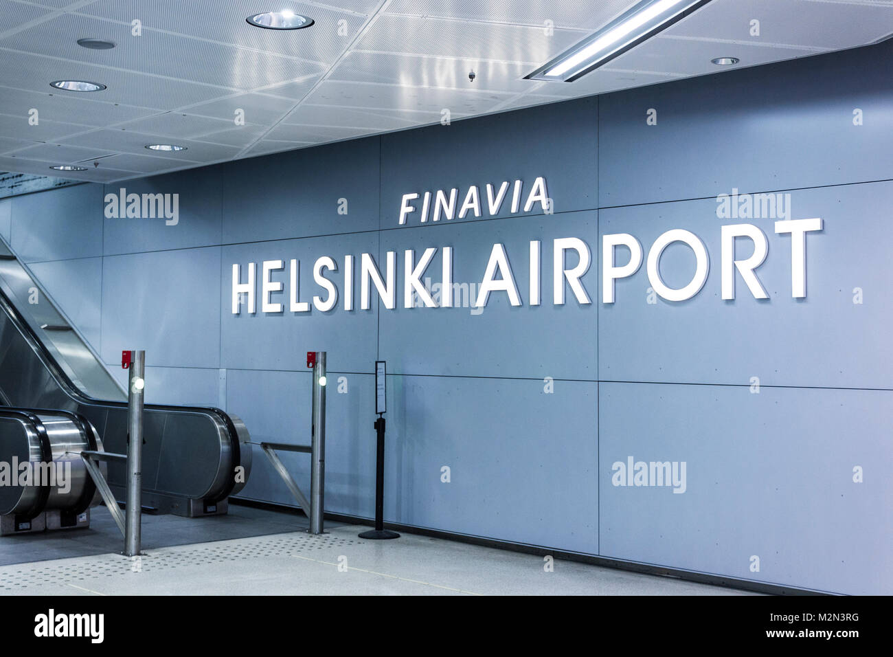 Signboard in Finavia train station at Helsinki-Vantaa Airport (HEL), close to an escalator inside the International Terminal at the base of Finnair, f Stock Photo