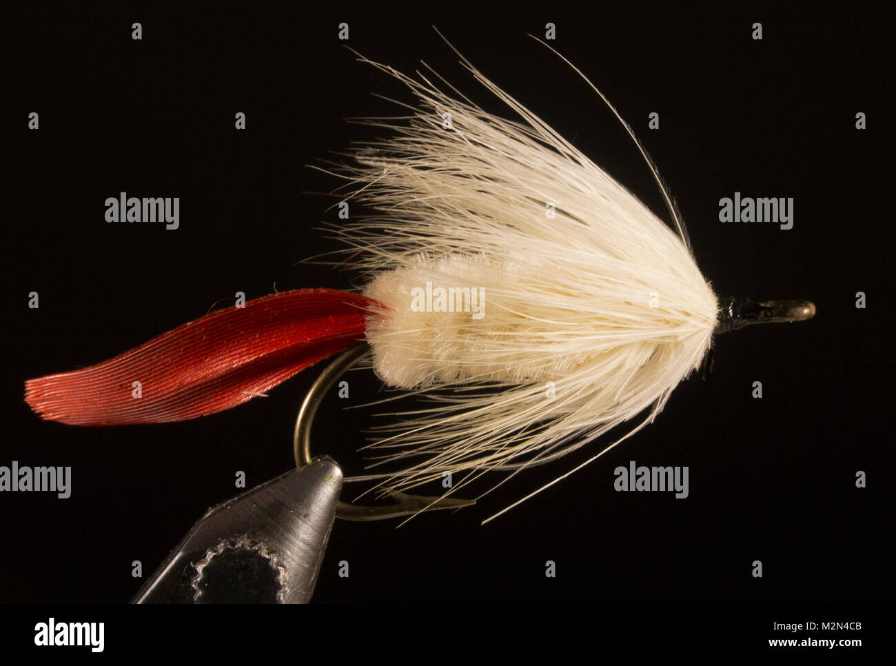 White Miller Bass Fly - unknown Hook: ring-eye bass hook. Size No