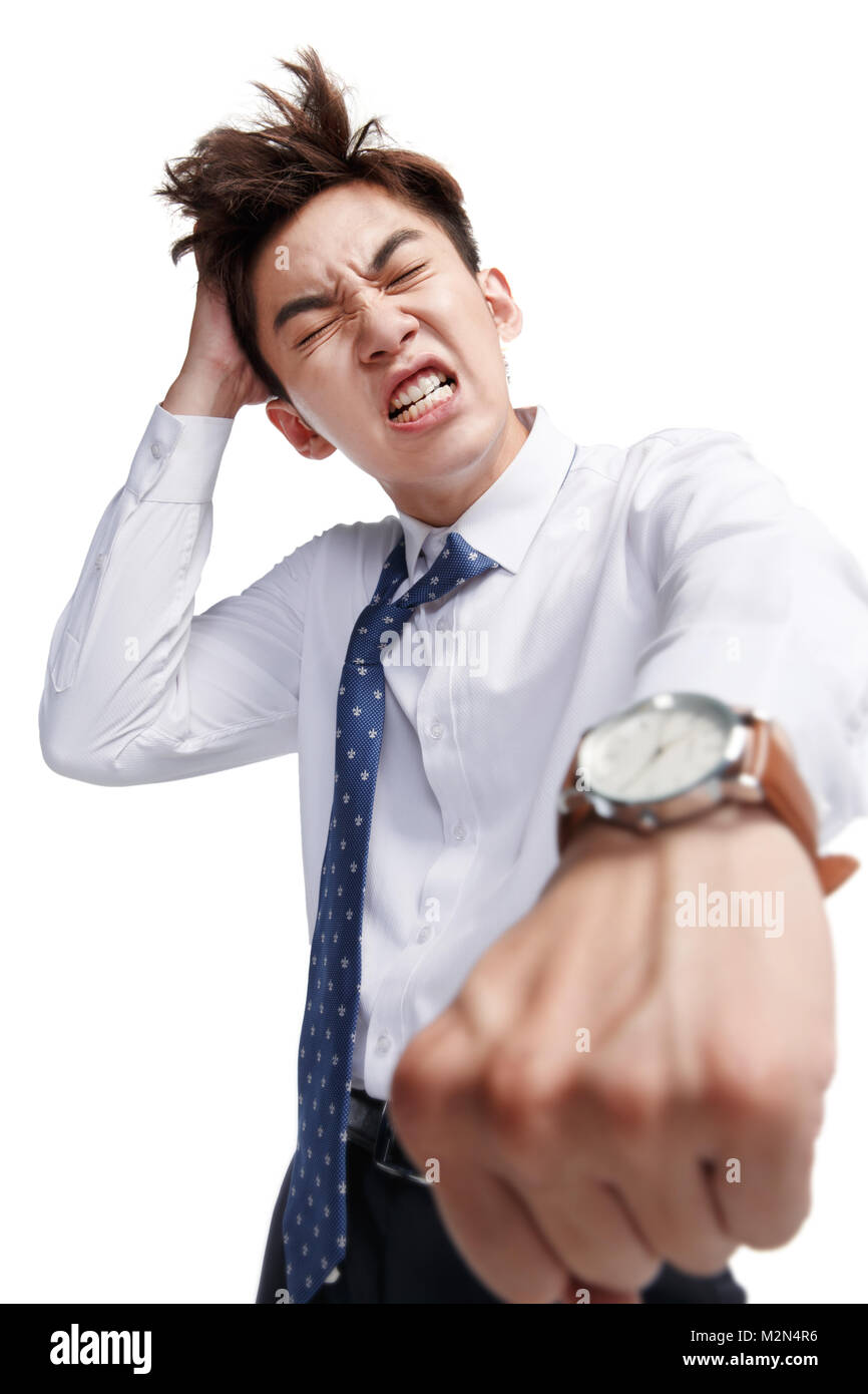 Distraught young business man Stock Photo