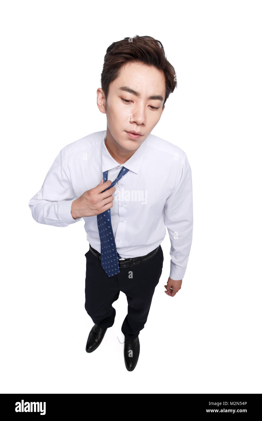 The exhausted business young man Stock Photo