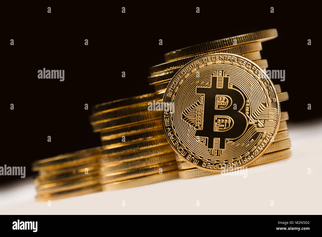 Golden bitcoin in pile of coins on background of BNP Paribas bank logo  Stock Photo - Alamy
