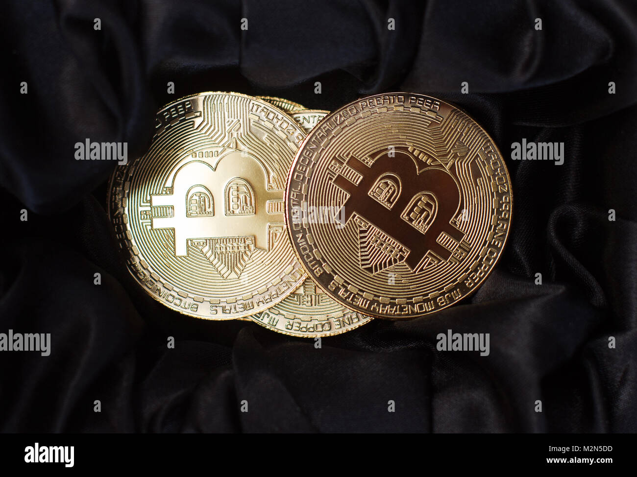 horizontal top view closeup of bitcoin golden metallic coins on black ...