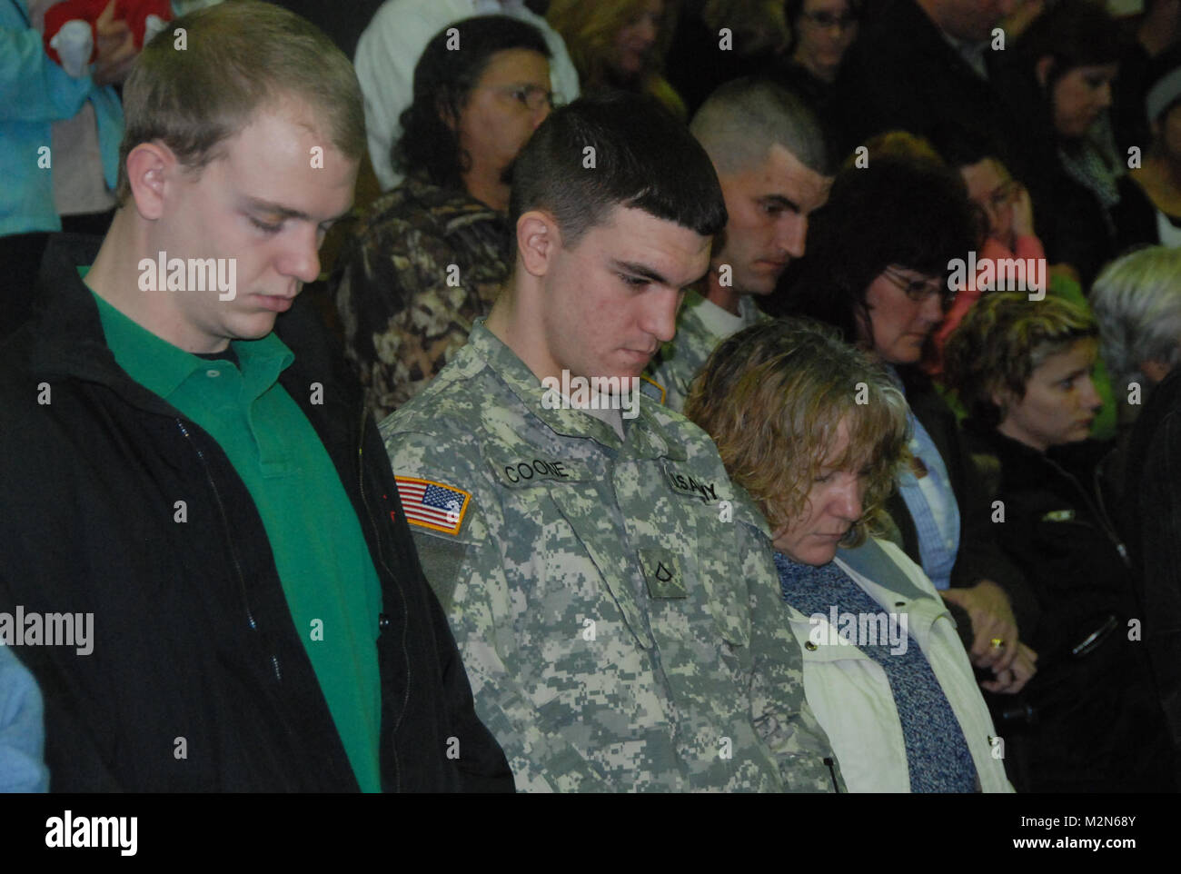 JEANERETTE, La. - Soldiers of the Louisiana Army National Guard's E Company, 199th Brigade Support Battalion, of the 256th Infantry Brigade Combat Team, bid farewell to family and friends at a deployment ceremony at Jeanerette High School in Jeanerette, La., Jan. 7.  (U.S. Army Photo by Sgt. Michael L. Owens, Louisiana National Guard State Unit Public Affairs Representative) 100107-A-0635O-029 by Louisiana National Guard Stock Photo