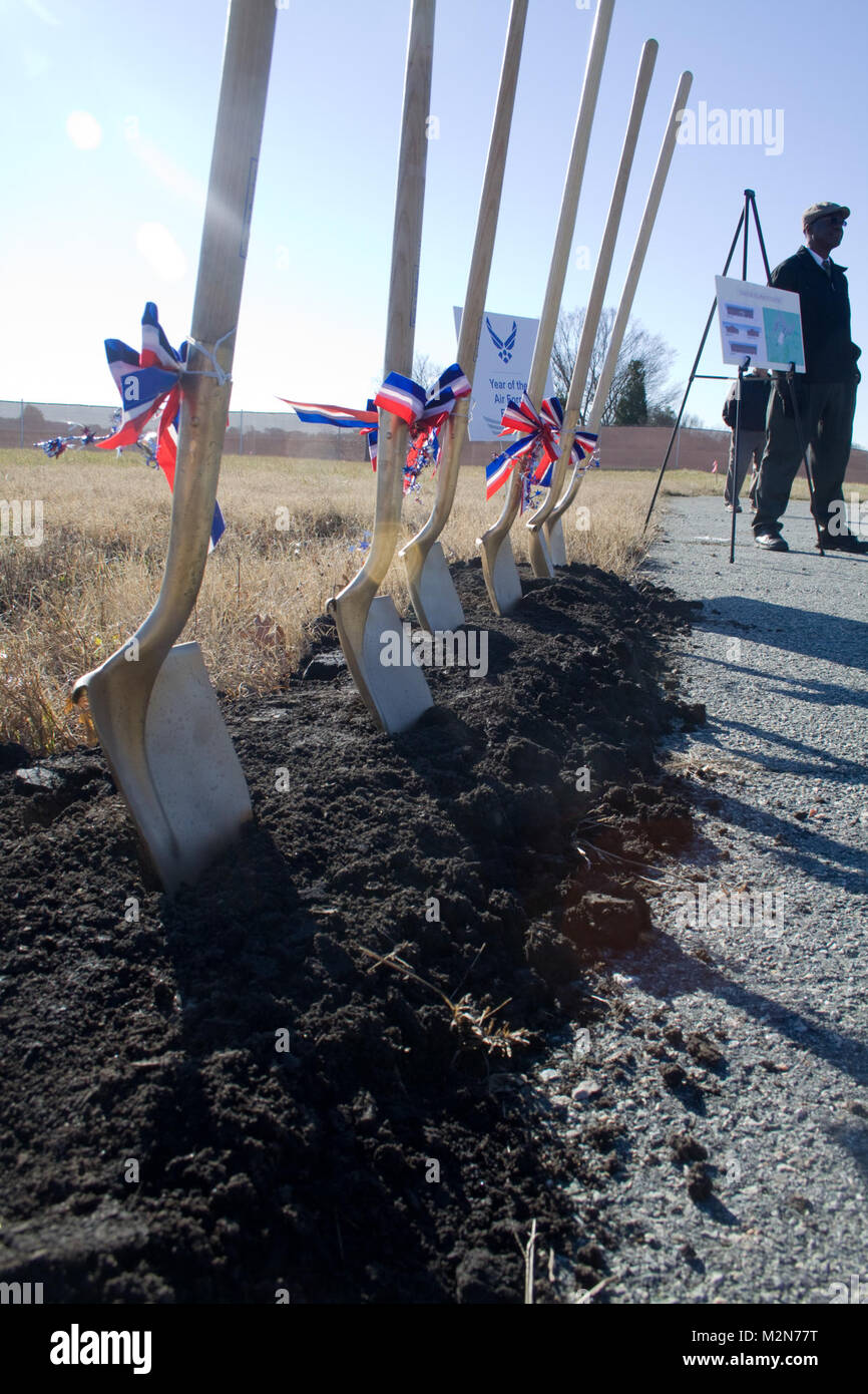 Shovels awaiting usage in a groundbreaking ceremony for a new child