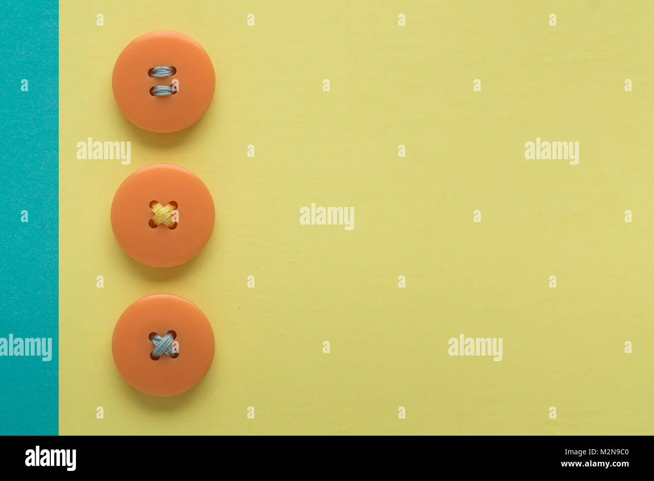 Pastel colors. Yellow and orange buttons on a yellow background Stock ...