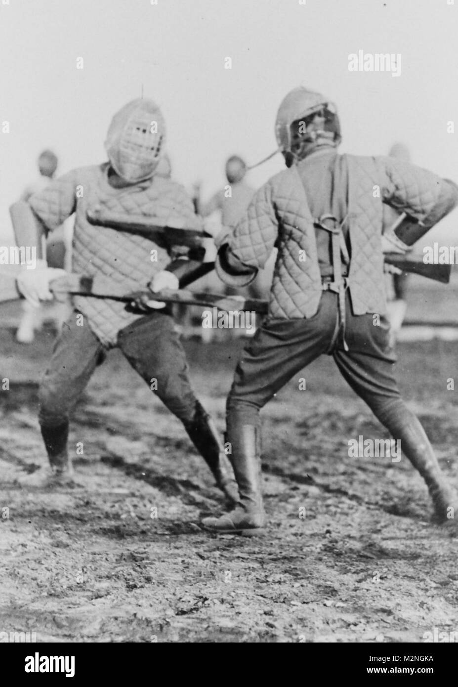 CAMP WHEELER, Macon, Ga., February 5, 1918 – Two men of the 31st Division fight with dummy rifles on the bayonet defense course, Camp Wheeler, Ga. Photo 4754, National Archives Records Administration (NARA), College Park, Md. Bayonette Fighting by Georgia National Guard Stock Photo