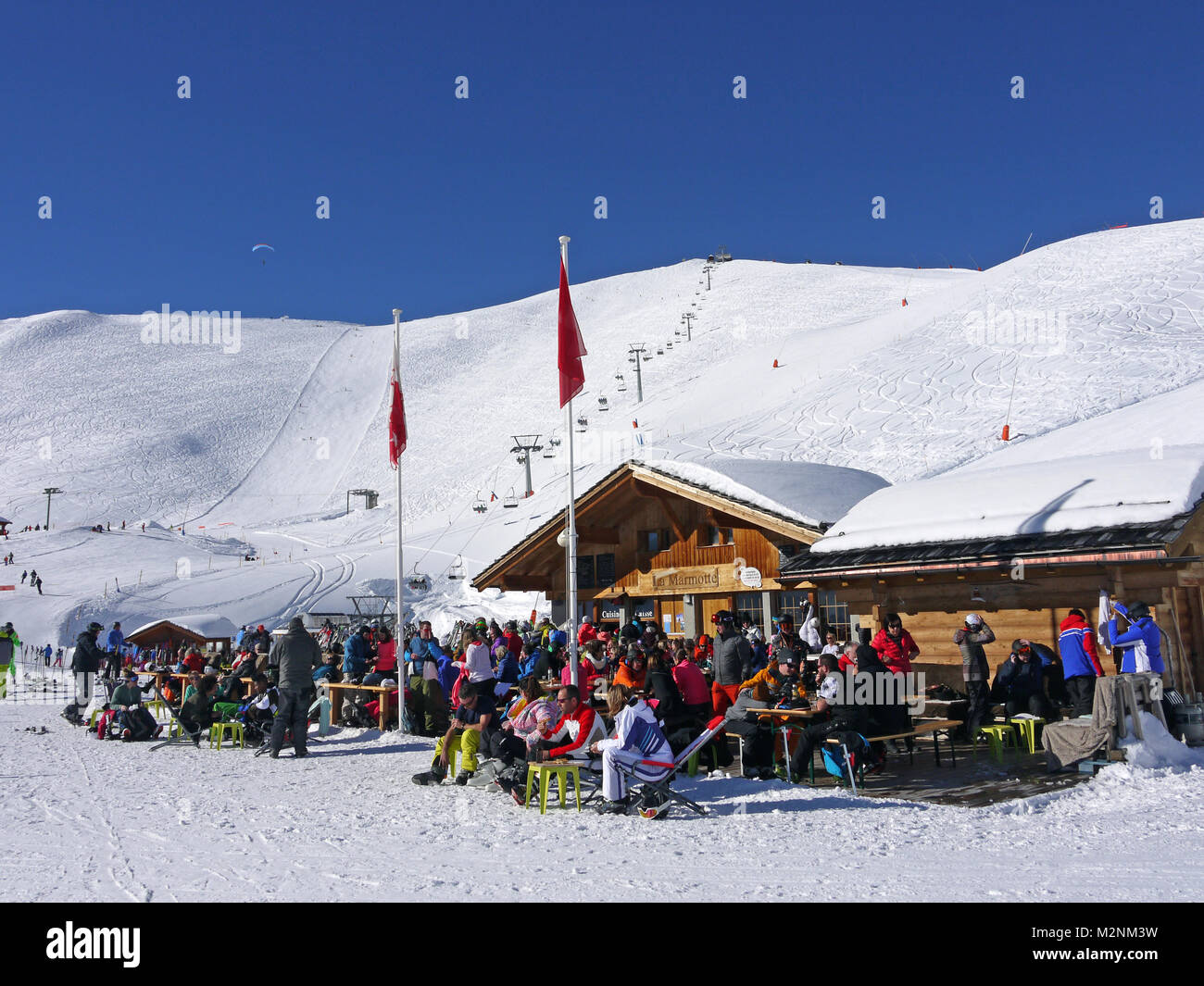 Winter scenes in the snowsports resort of Zinal in the Valais canton of Switzerland and showing the Marmotte Cafe on the slopes at Sorebois. Stock Photo