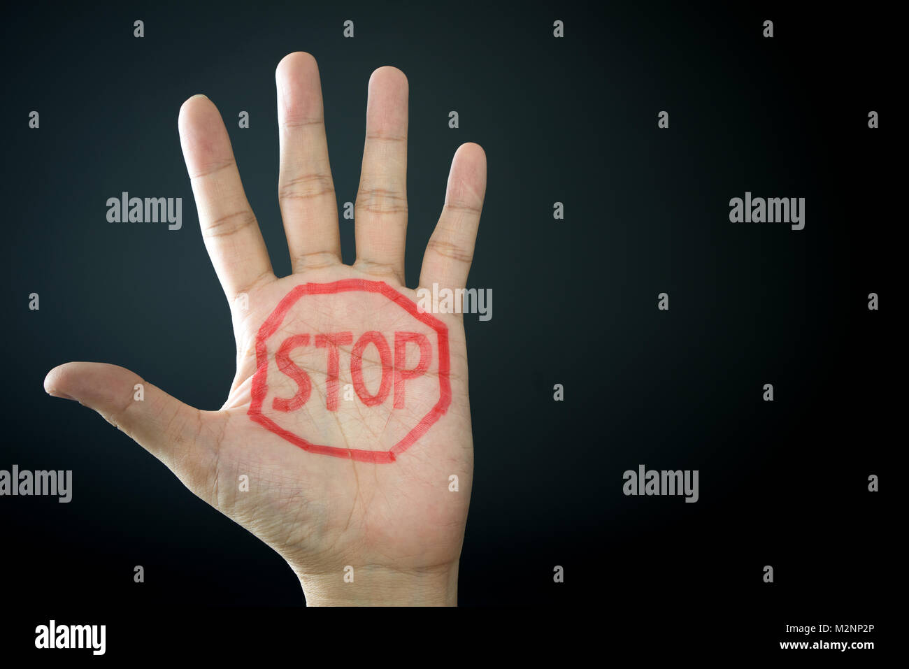Human Hand Showing Stop Sign Stock Photo - Download Image Now