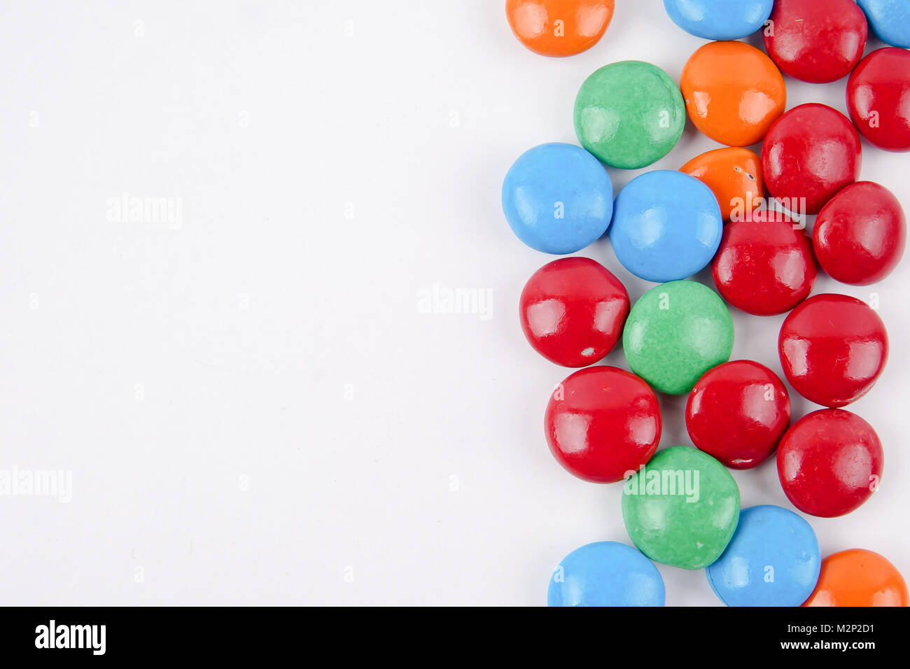 Colorful candy on a white background Stock Photo - Alamy