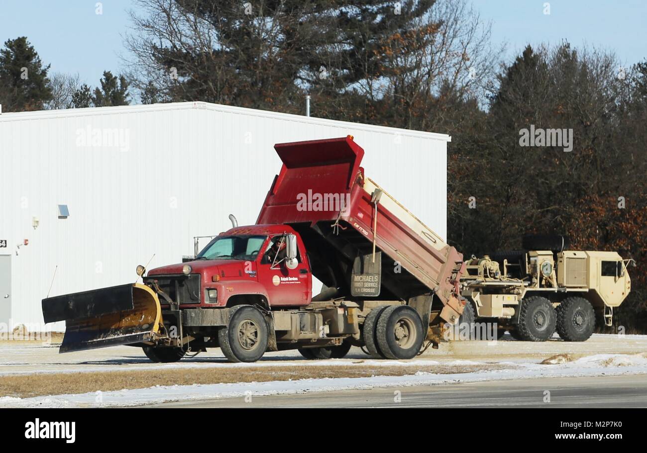 An equipment operator with the Fort McCoy snow removal contractor